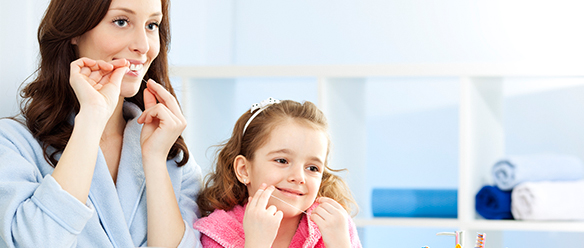 how to teach your kids to floss featured